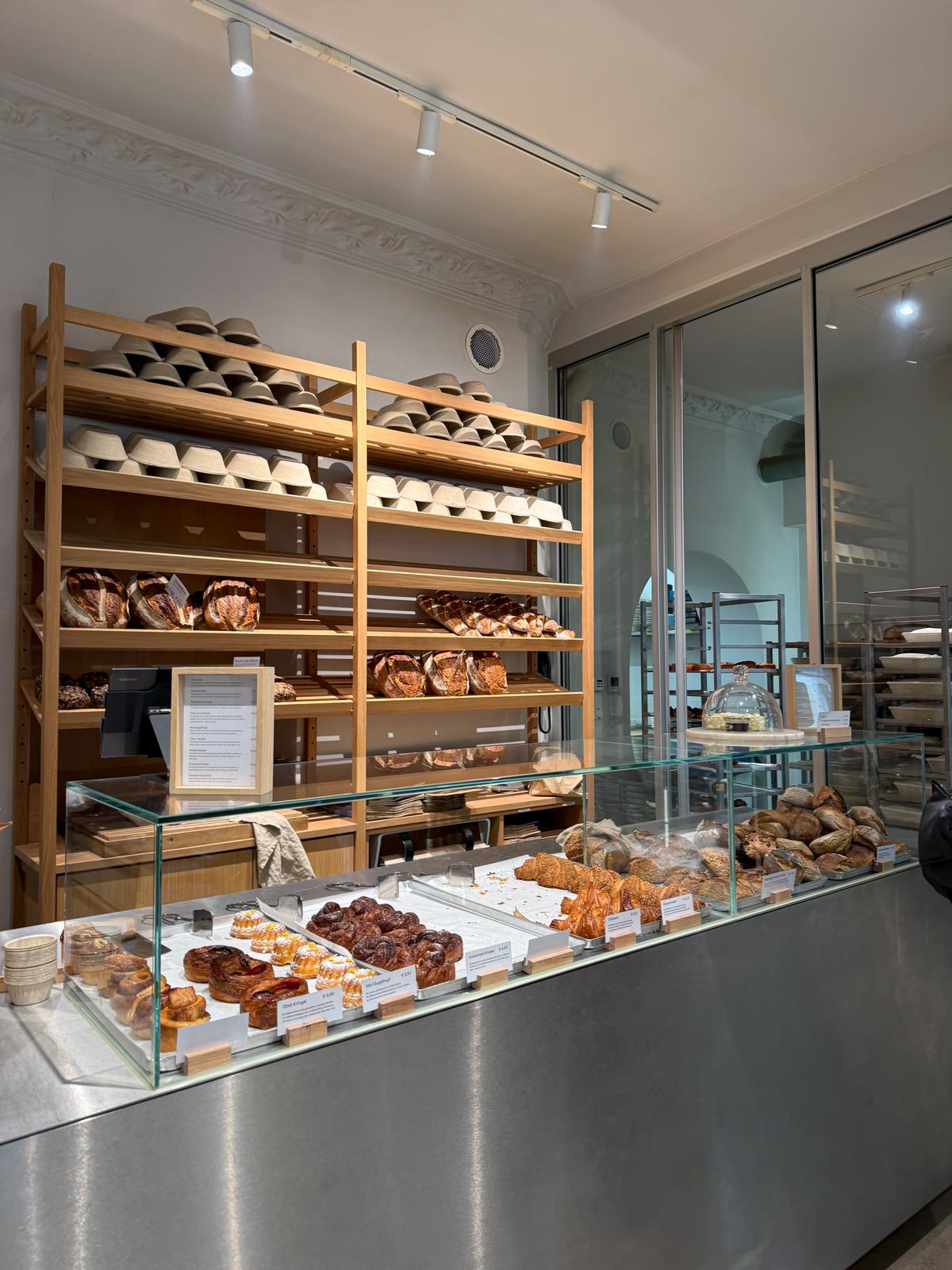 A Berlin bakery counter with bread and pastries