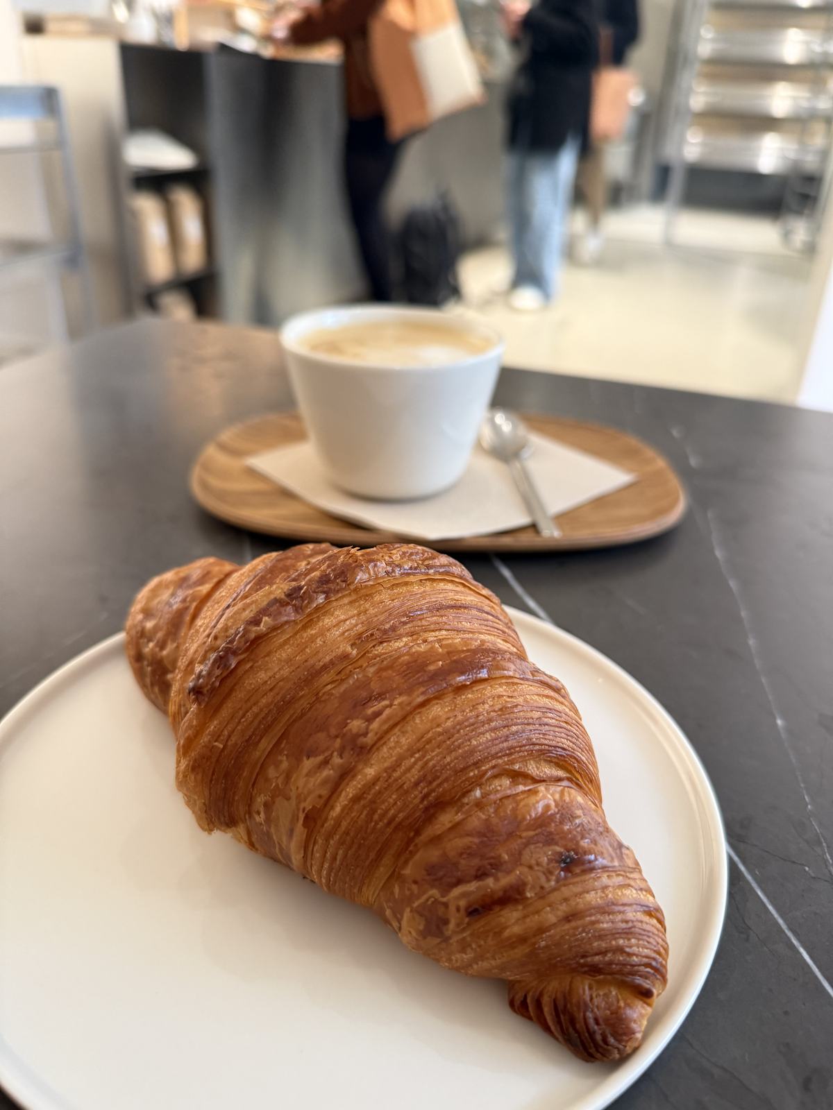 A croissant and a cappuccino before the first session