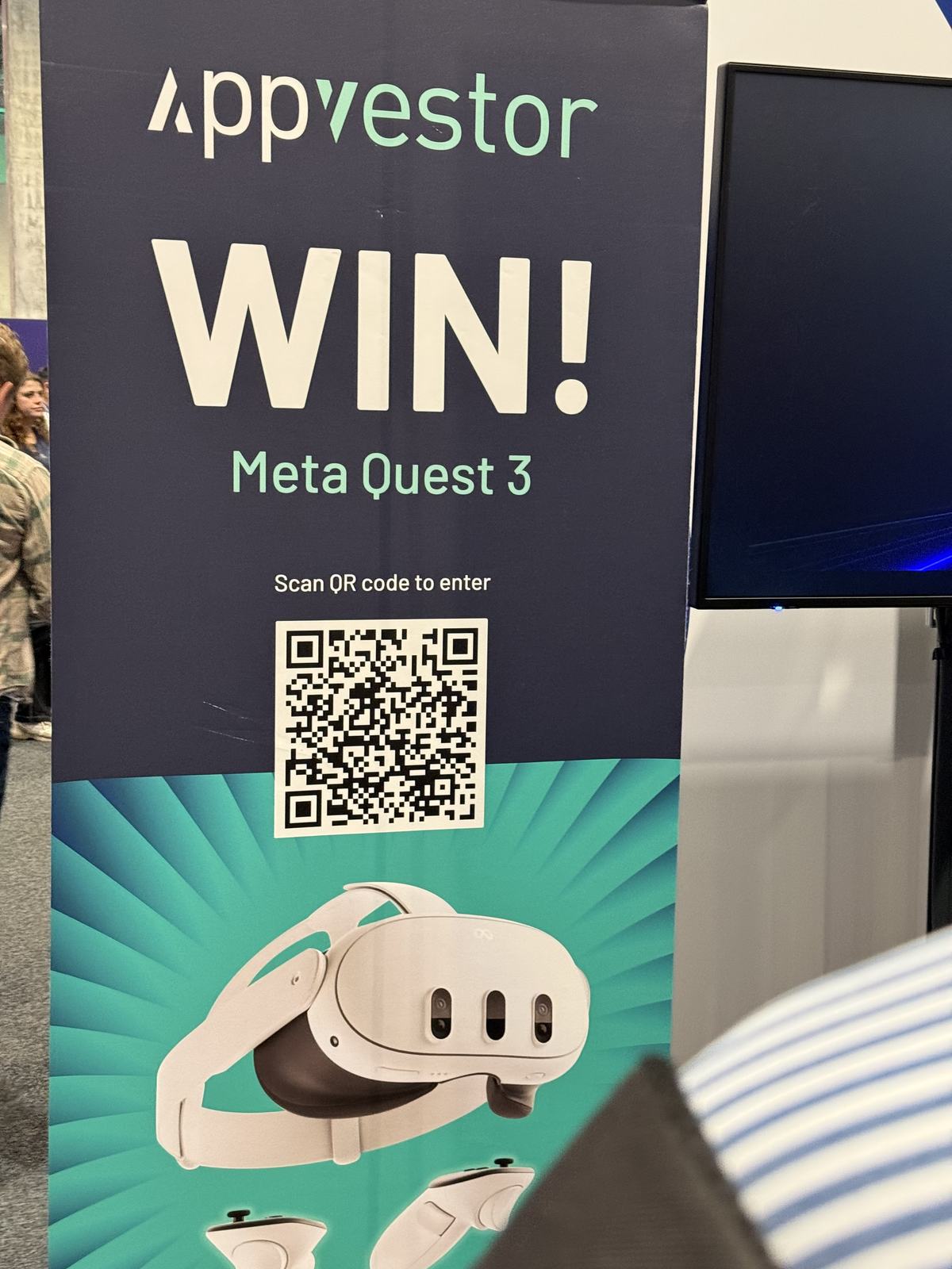 A stand giving away a Meta Quest 3