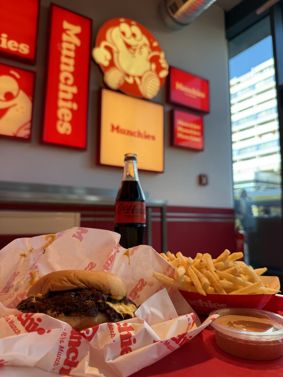A smash burger, fries and a Coke at Munchies in Berlin