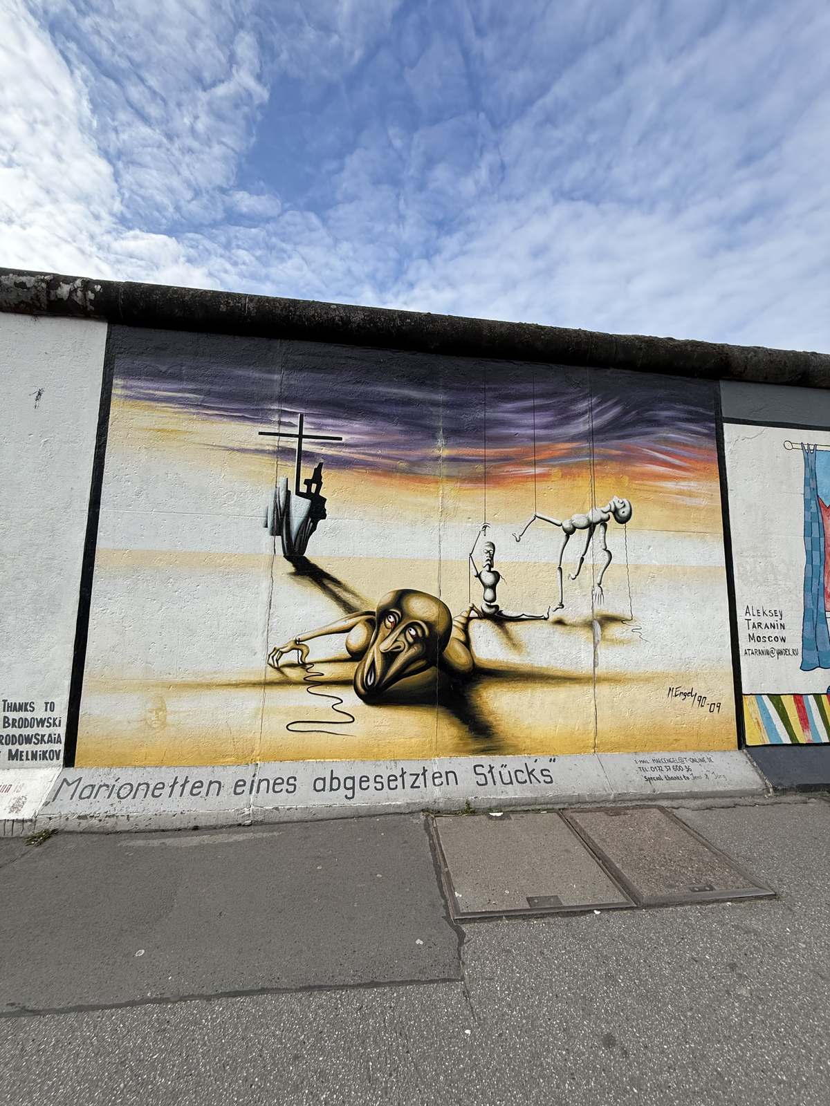 A mural of a gymnast on the East Side Gallery
