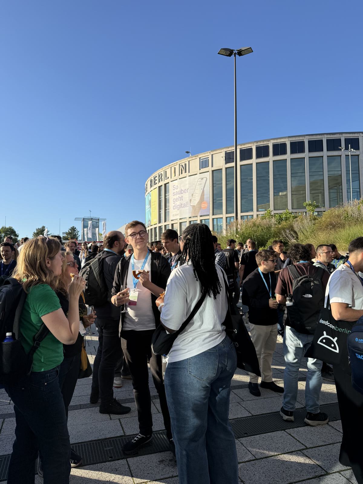 Attendees networking outside the halls at Messe Berlin