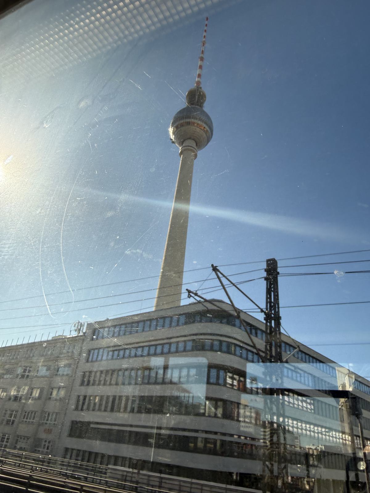 The Berlin TV tower seen from the window of an S-Bahn train