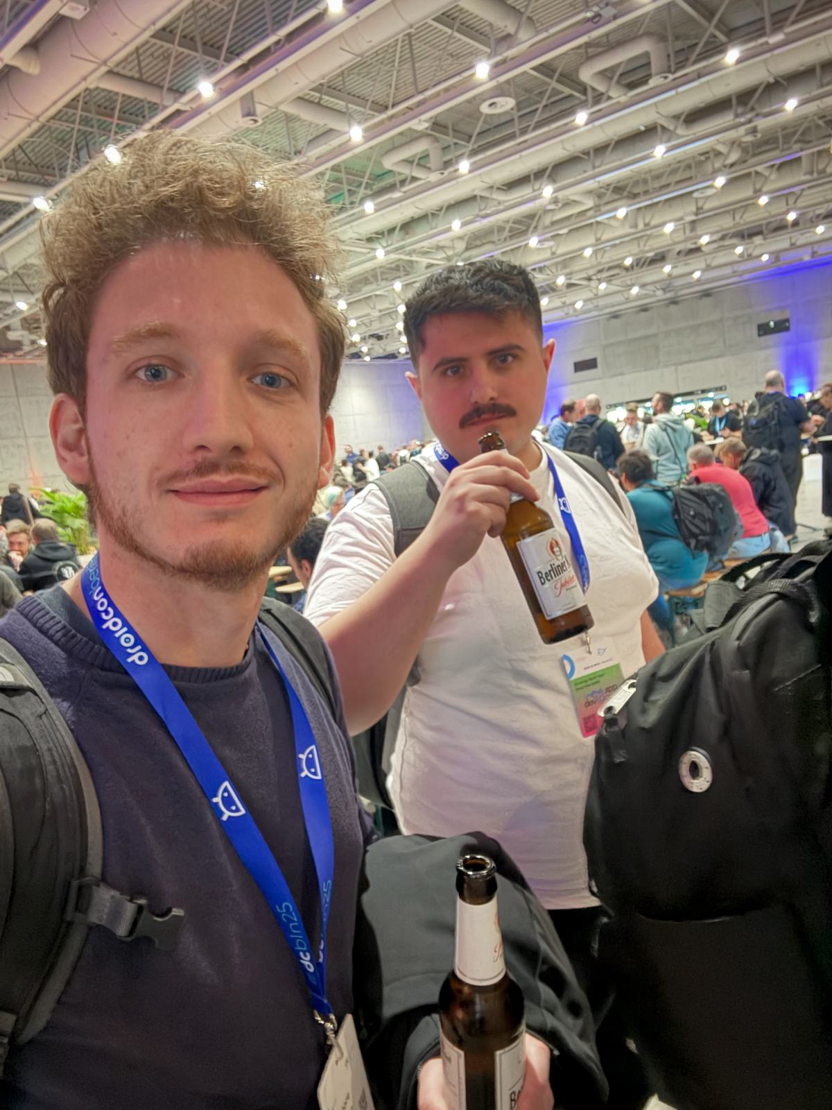 Selfie with a beer inside the venue during the networking break