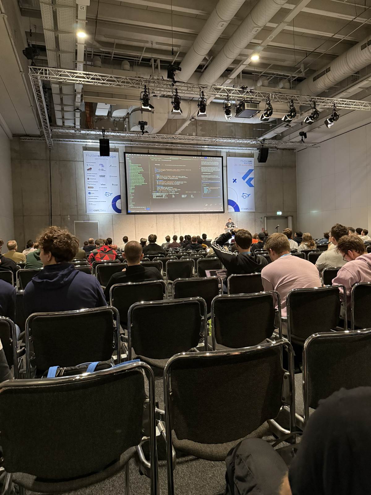 The audience of a session seen from the back of the room