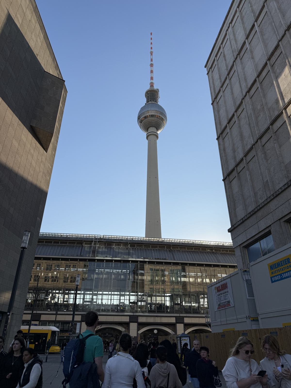 The Fernsehturm framed between two buildings at Alexanderplatz
