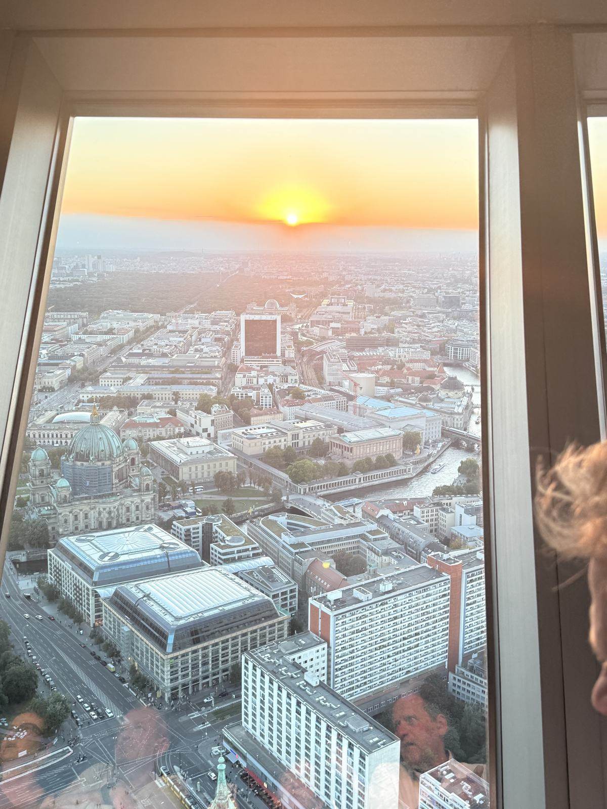 Sunset over Berlin seen from the TV tower observation deck