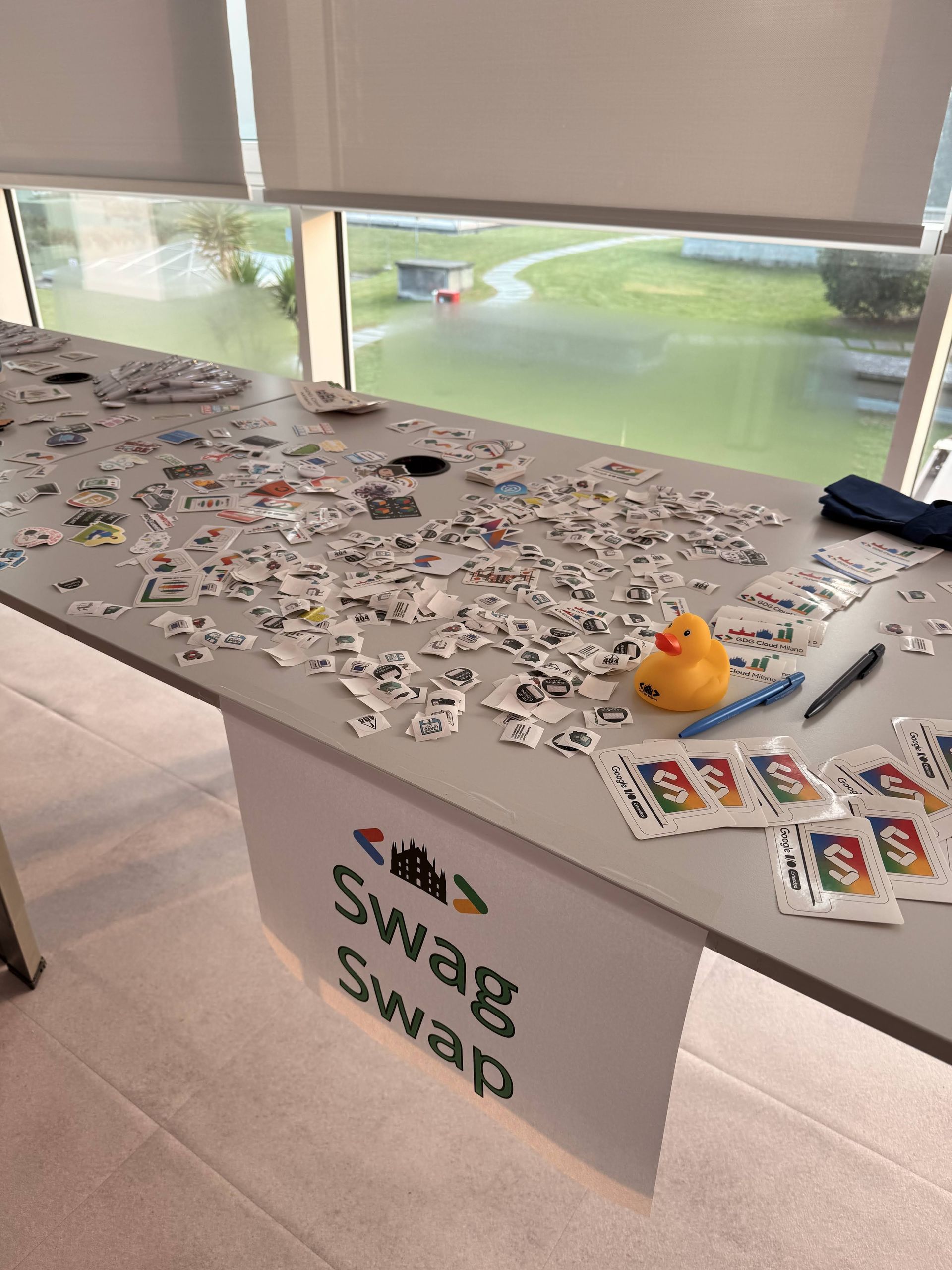 Stickers spread across the swag swap table