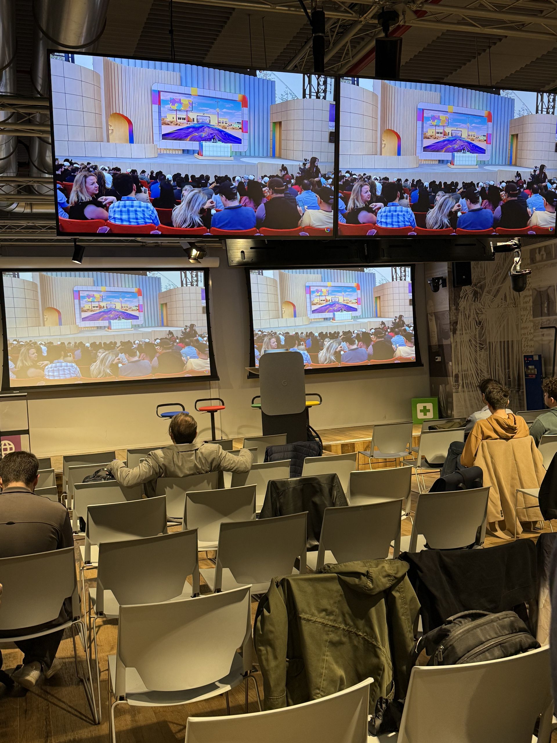 The keynote playing on all the screens of the room