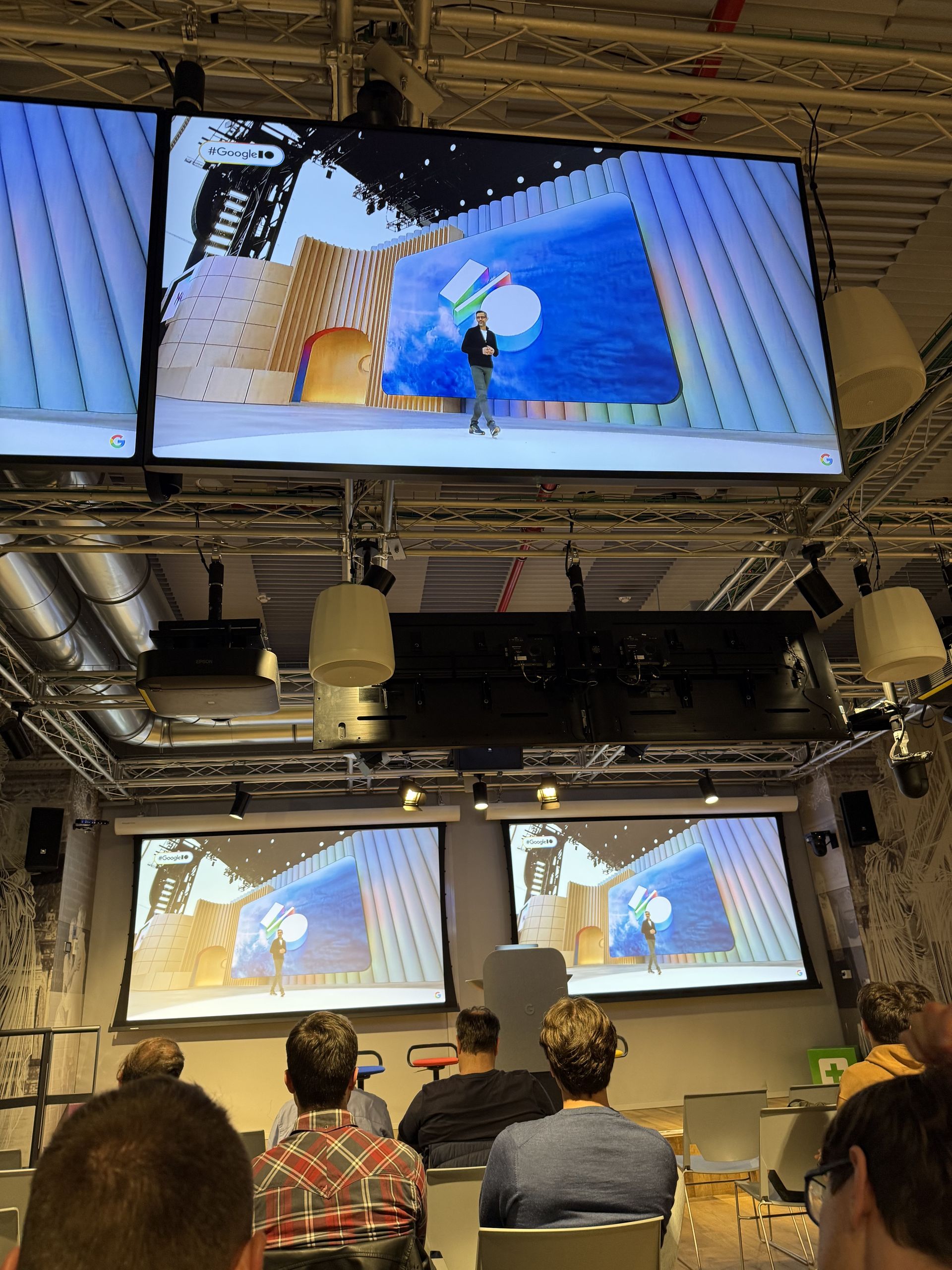 Sundar Pichai walking out onto the Shoreline stage, on the screens