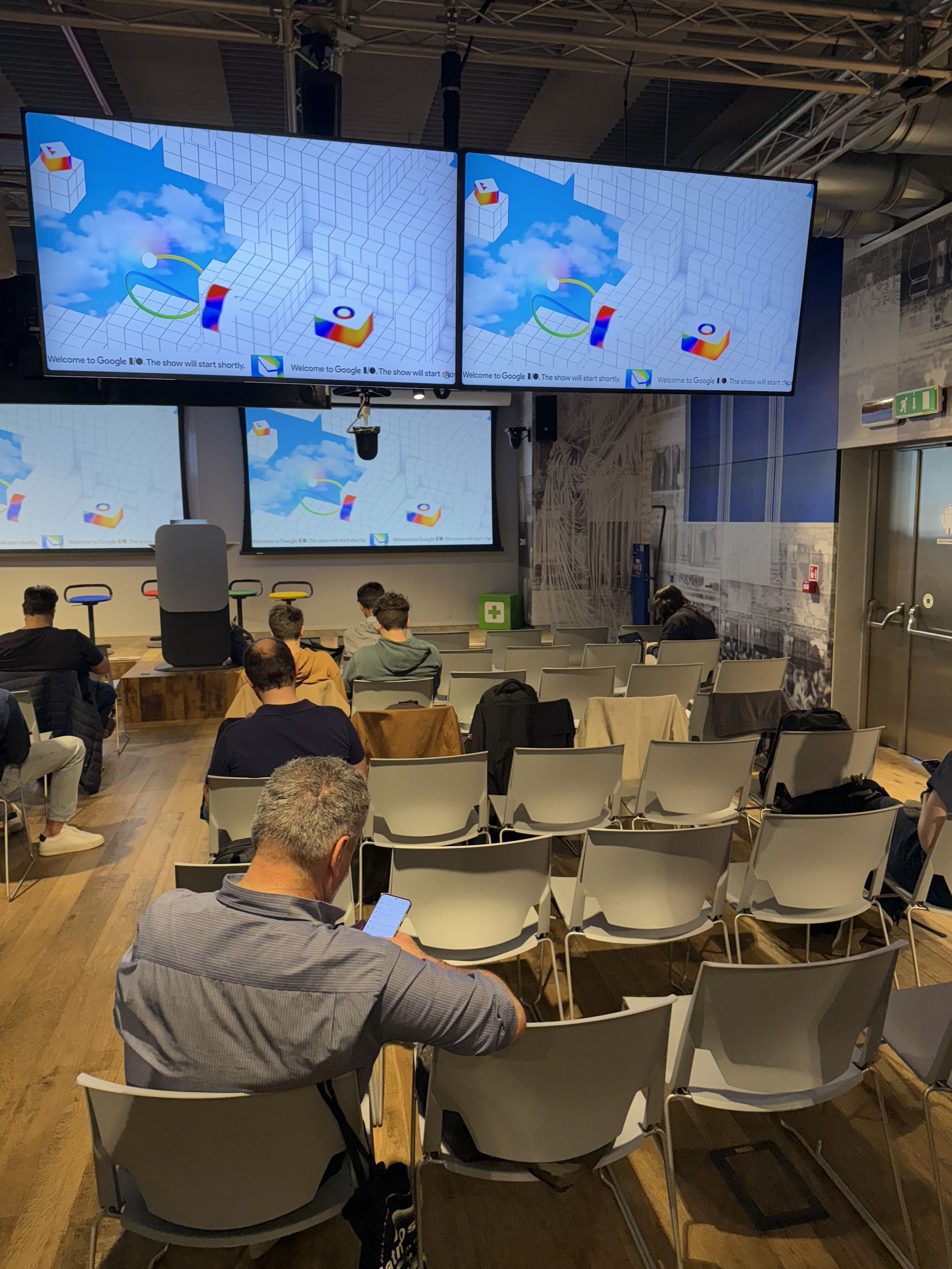 Clouds and rockets of the I/O pre-show animation on the screens