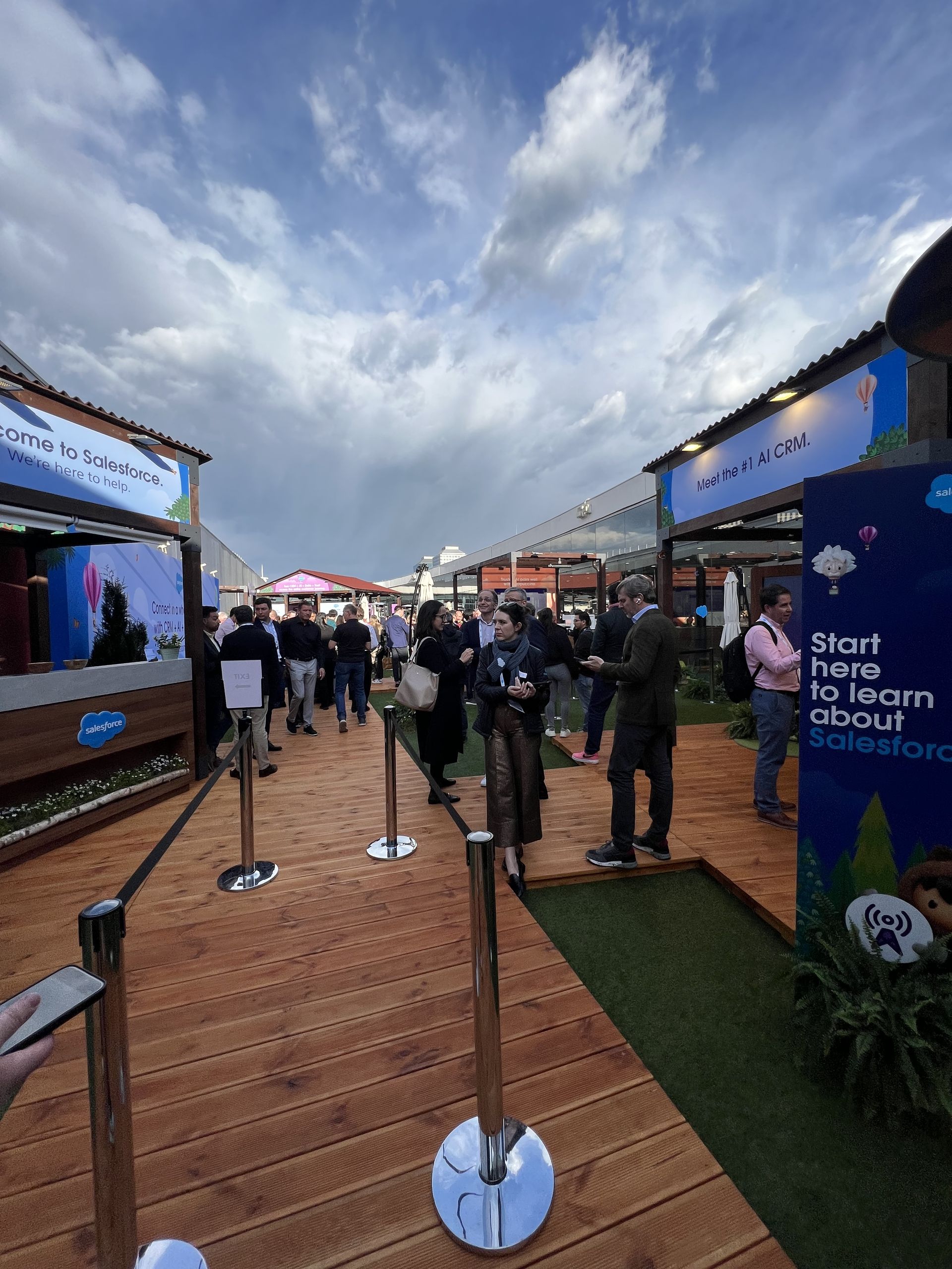 The wooden boardwalk of the outdoor Salesforce village
