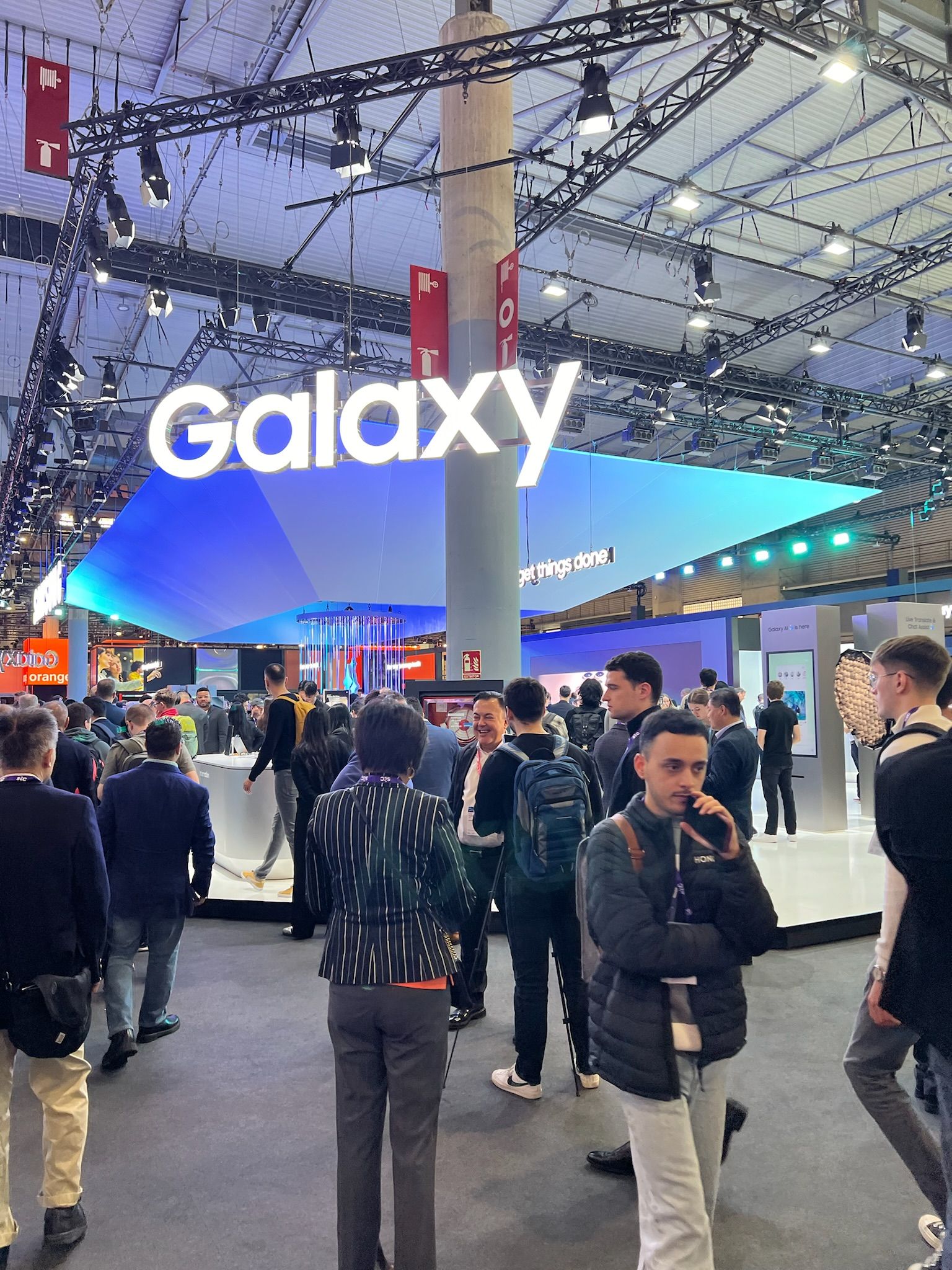 The Samsung Galaxy sign hanging over the stand in Hall 3