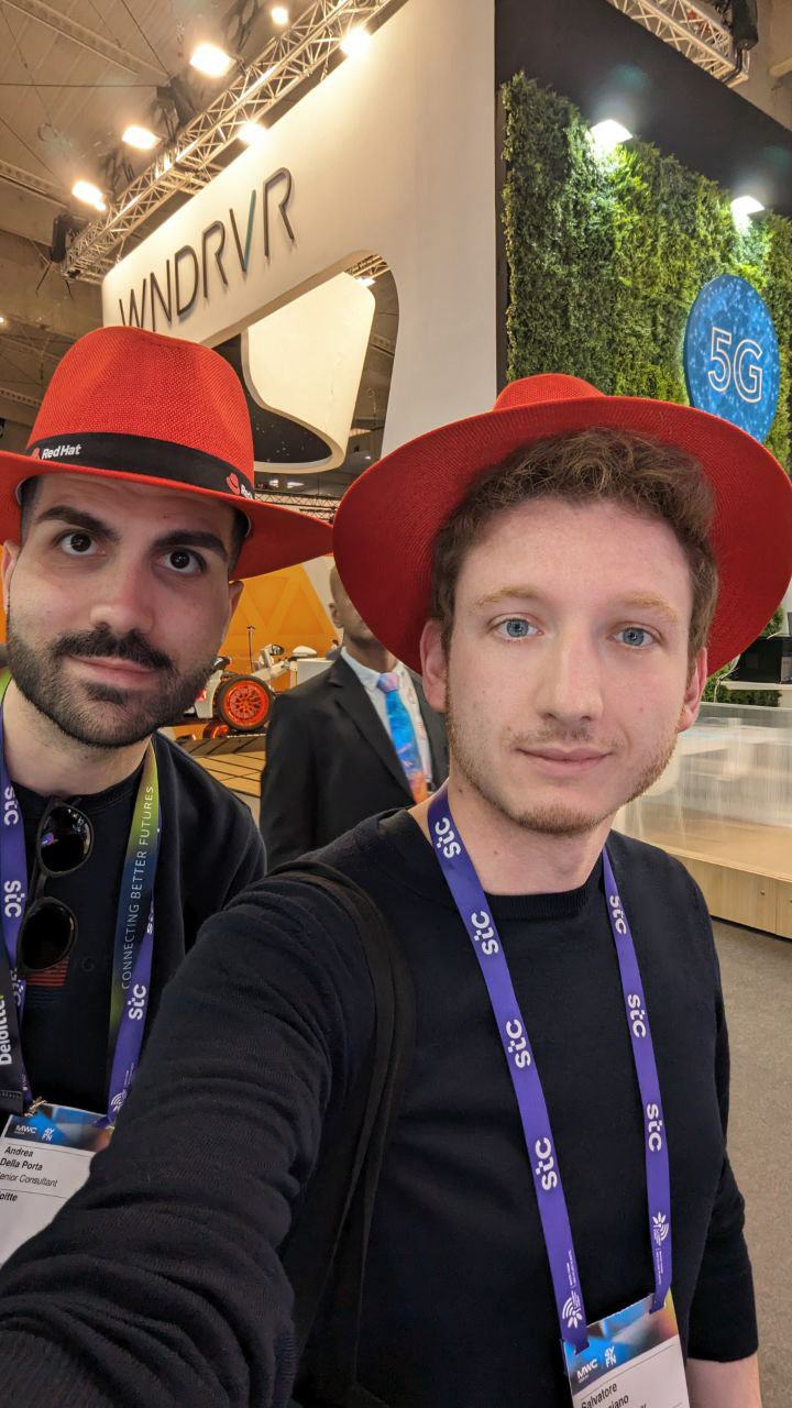 Selfie with red hats picked up at a stand