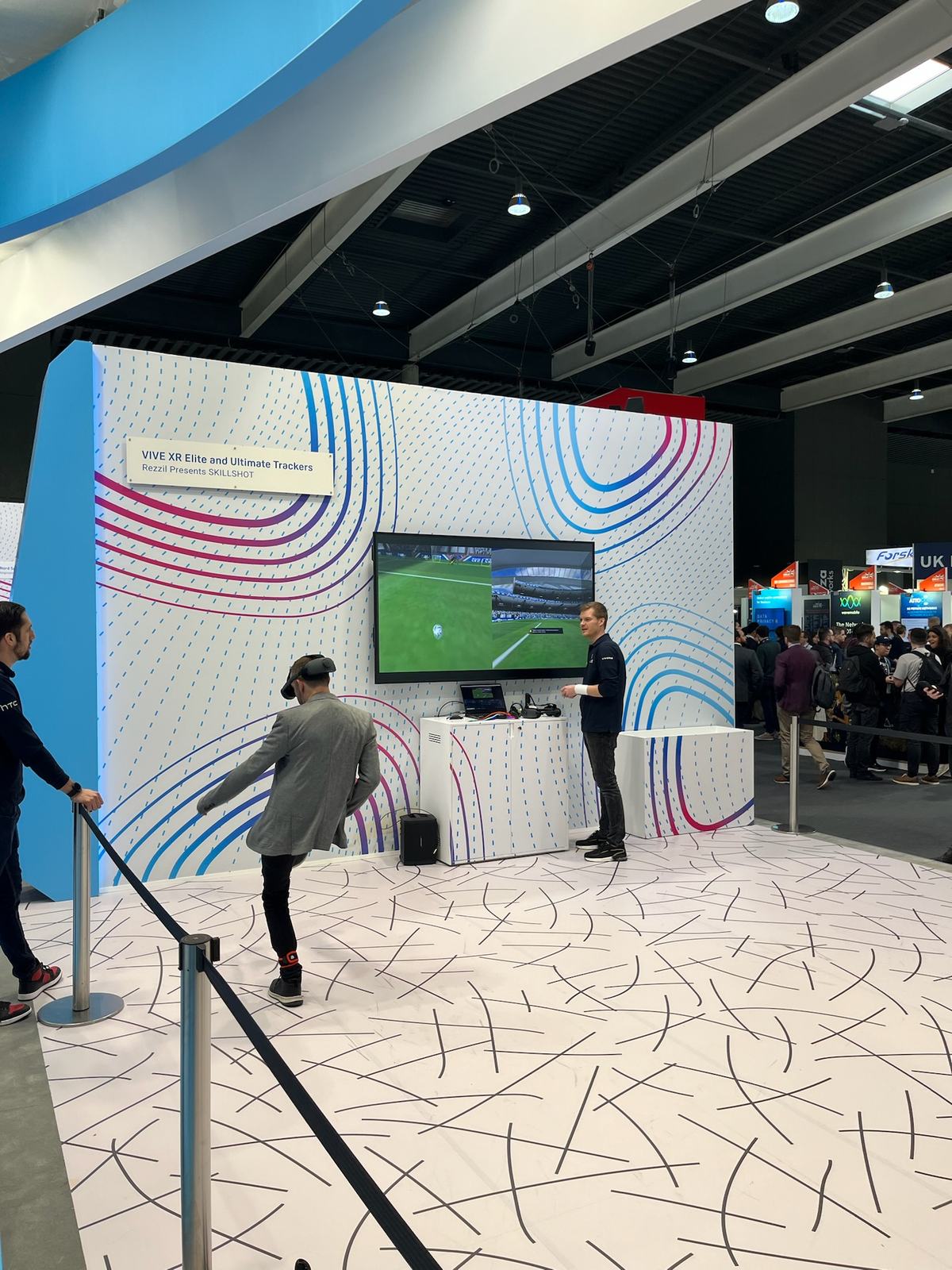 An interactive demo area with a large screen